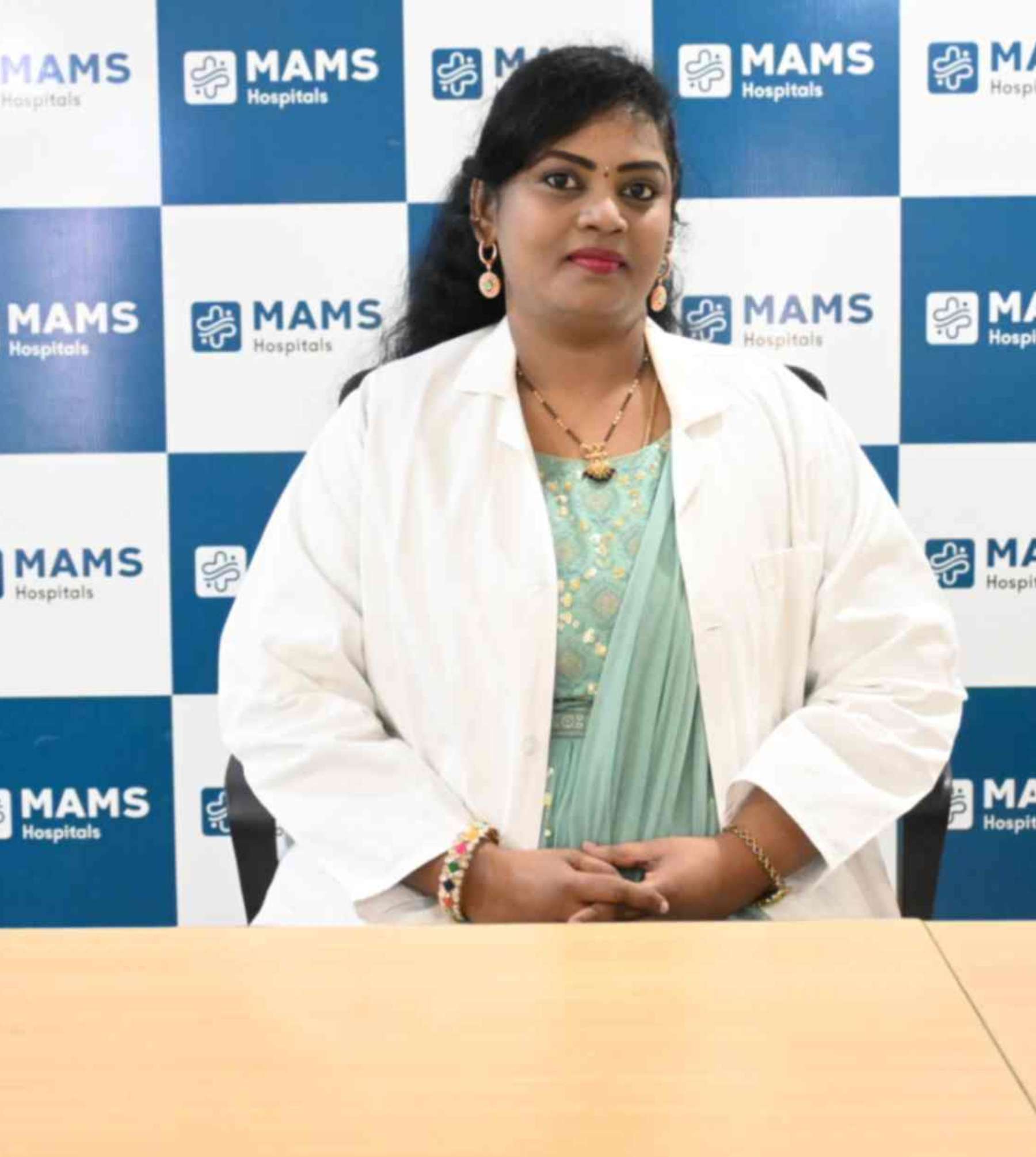 DR DIVYA POTHATI